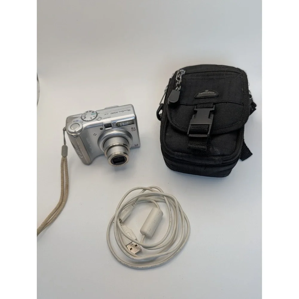 Canon PowerShot A530 5.0MP Digital Camera Silver 4x Zoom with Samsonite Case USB